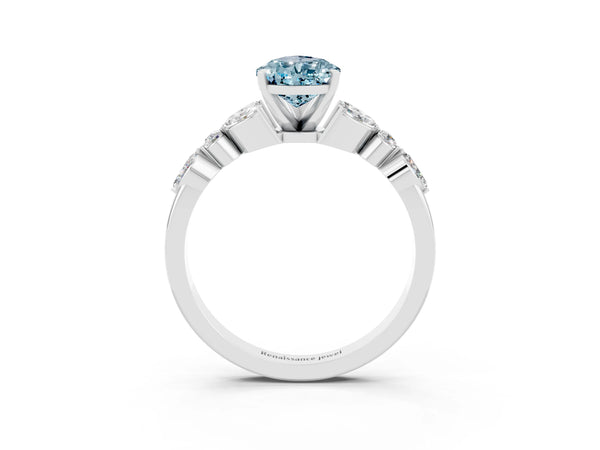 Platinum Pear Cut Aquamarine Solitaire Ring with Side Stones and Four-Prong Setting