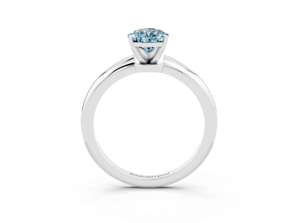 Silver Pear Cut Aquamarine Solitaire Ring with Six-Prong Setting and Classic Band