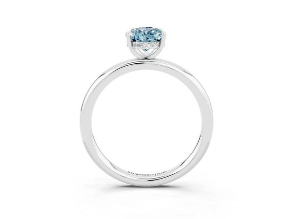 White gold Pear Cut Aquamarine Solitaire Ring with Thin Band and Four-Prong Setting