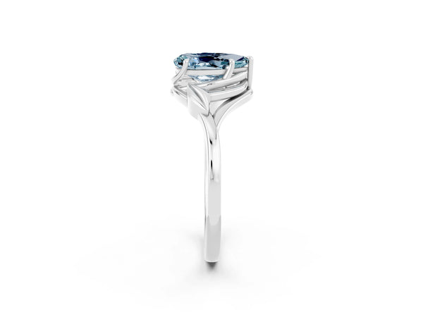 Silver Pear Cut Aquamarine Solitaire Ring with Twist Band and Four-Prong Setting