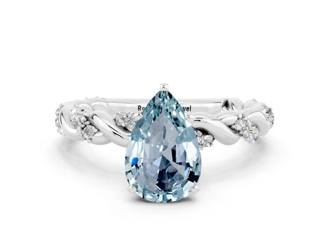 White gold Pear Cut Aquamarine Solitaire Ring with Twisted Band and Pavé Accents