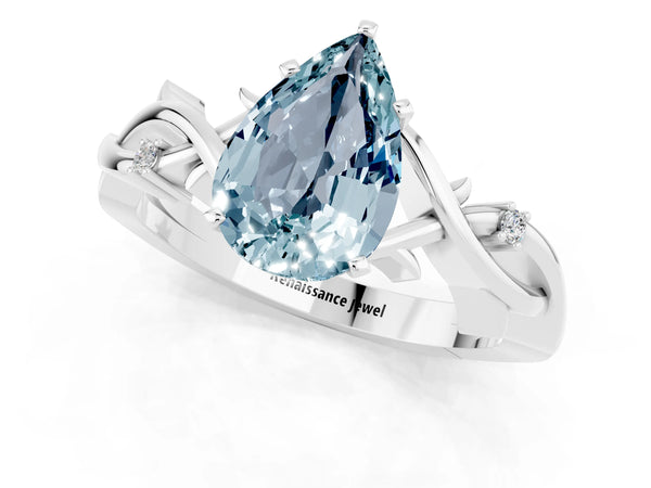 Silver Pear Cut Aquamarine Solitaire Ring with Twisted Band and Prong Setting