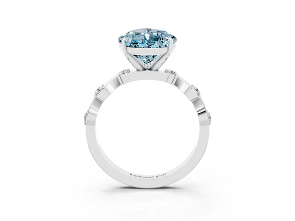 Platinum Pear Cut Aquamarine Solitaire Twisted Band with Round  Accents and Prong Setting