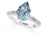 White gold Pear Cut Aquamarine Solitaire with Side Baguettes and Channel Set Band_1
