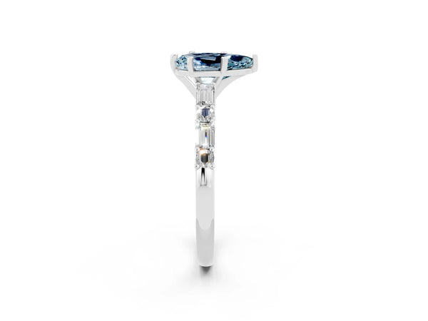 Platinum Pear Cut Aquamarine Solitaire with Side Baguettes and Channel Set Band