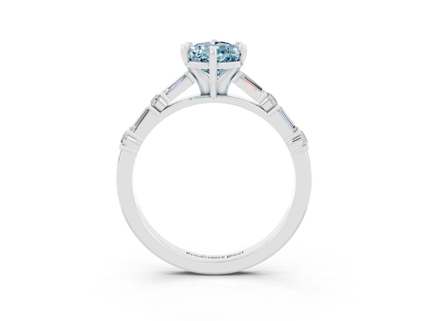 Silver Pear Cut Aquamarine Solitaire with Side Baguettes and Channel Set Band