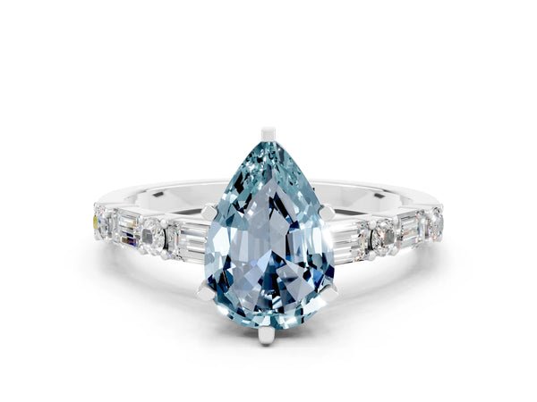 Silver Pear Cut Aquamarine Solitaire with Side Baguettes and Channel Set Band