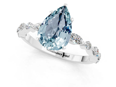 White gold Pear Cut Aquamarine Solitaire with Side Stones on a Pavé Band and Four-Prong Setting_1