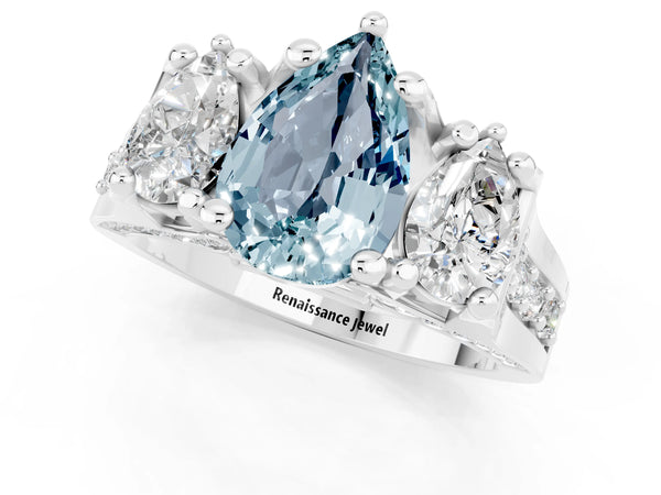 White gold Pear Cut Aquamarine Three-Stone Ring with Channel Set Band and Four-Prong Setting