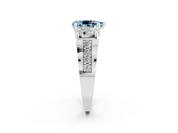 Silver Pear Cut Aquamarine Three-Stone Ring with Channel Set Band and Four-Prong Setting