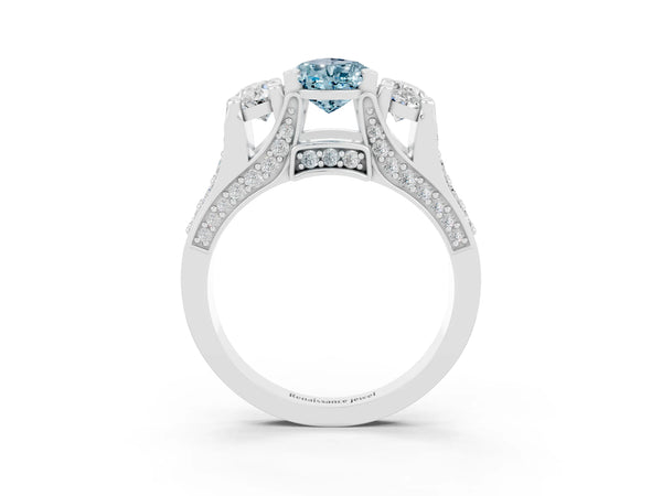 Platinum Pear Cut Aquamarine Three-Stone Ring with Channel Set Band and Four-Prong Setting