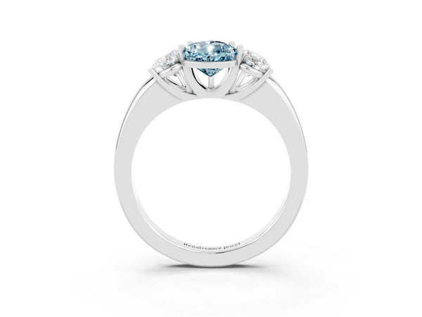 Platinum Pear Cut Aquamarine Three-Stone Ring with Four-Prong Setting and Classic Band