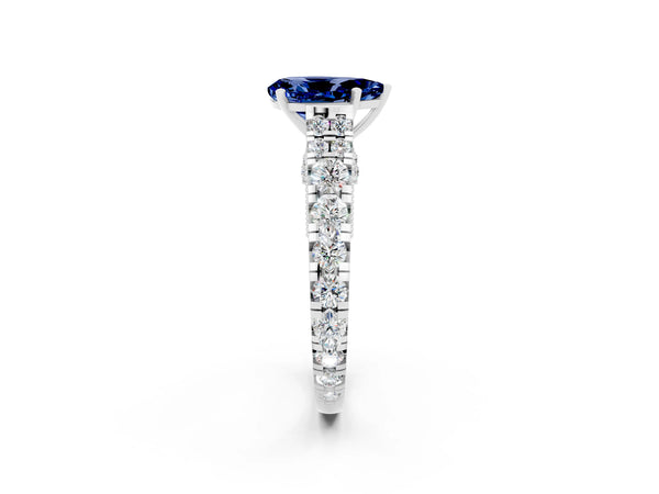 White gold Pear Cut Blue Sapphire Classic Solitaire Ring with Pavé Band and Four-Prong Setting