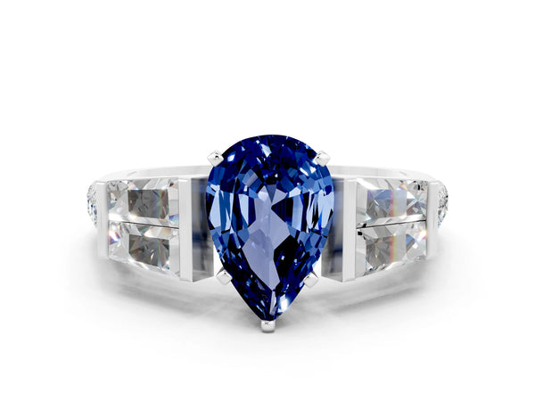 White gold Pear Cut Blue Sapphire Engagement Ring with Baguette Side Stones and Channel Set Band