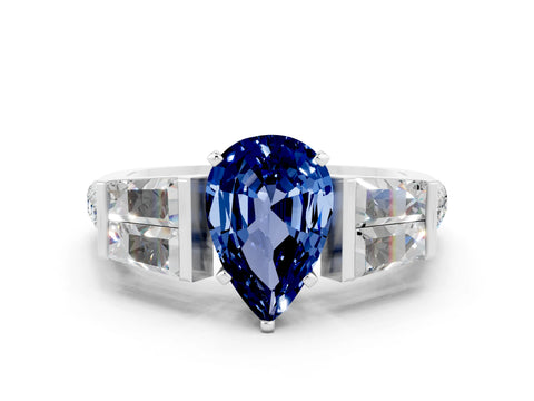 White gold Pear Cut Blue Sapphire Engagement Ring with Baguette Side Stones and Channel Set Band