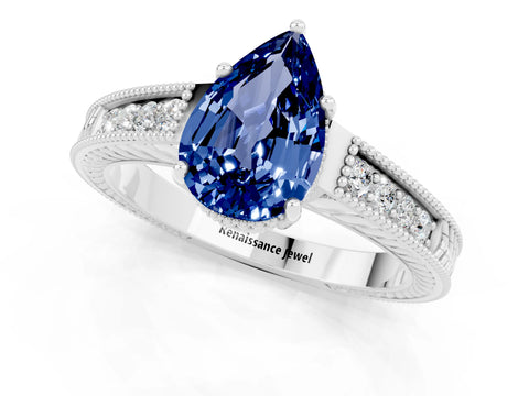 White gold Pear Cut Blue Sapphire Engagement Ring with Milgrain Channel Set Band and Prong Setting_1
