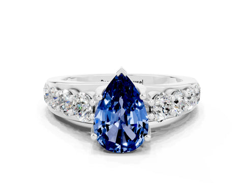 White gold Pear Cut Blue Sapphire Engagement Ring with Pavé Band and Four-Prong Setting