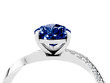 White gold Pear Cut Blue Sapphire Engagement Ring with Side Stone Accents and Four-Prong Setting_100