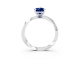 White gold Pear Cut Blue Sapphire Engagement Ring with Side Stone Accents and Four-Prong Setting_39