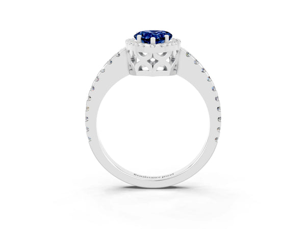Platinum Pear Cut Blue Sapphire Halo Engagement Ring with Pavé Band and Prong Setting