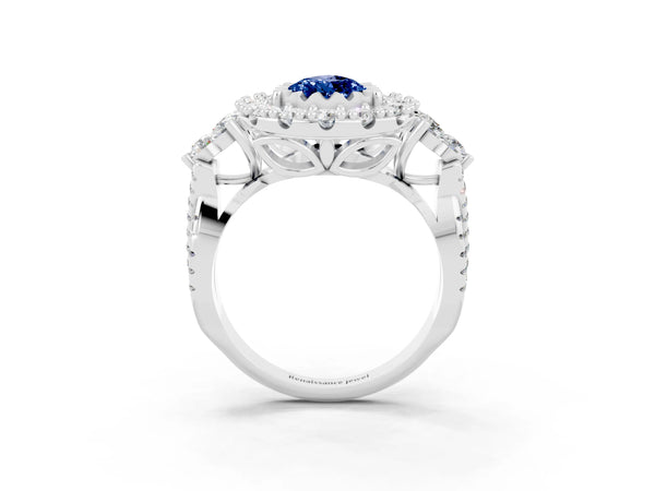 White gold Pear Cut Blue Sapphire Halo Ring with Pavé Band and Four-Prong Setting