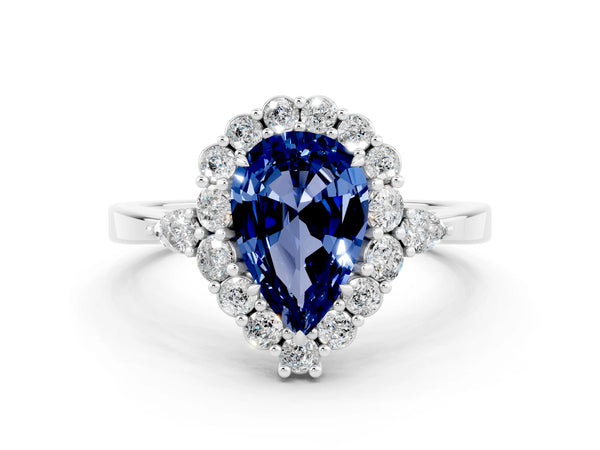 Platinum Pear Cut Blue Sapphire Halo Ring with Pear Side Stones and Prong Setting