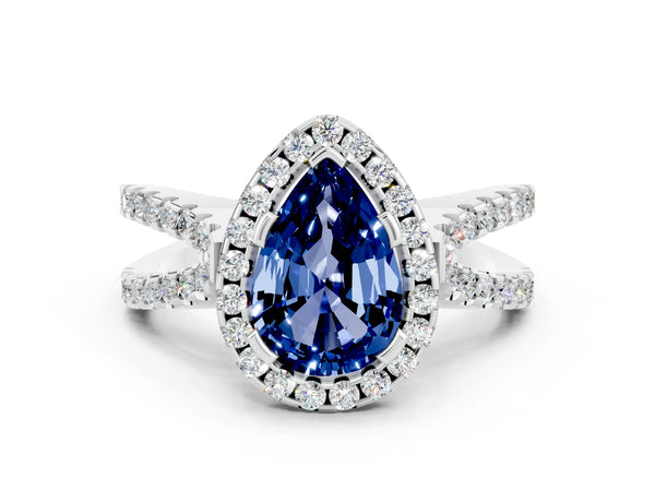 Platinum Pear Cut Blue Sapphire Halo Ring with Split Shank Pavé Band and Prong Setting