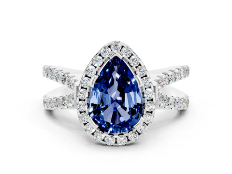 White gold Pear Cut Blue Sapphire Halo Ring with Split Shank Pavé Band and Prong Setting