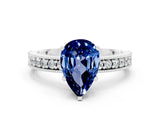 White gold Pear Cut Blue Sapphire Milgrain Pavé Engagement Ring with Four-Prong Setting