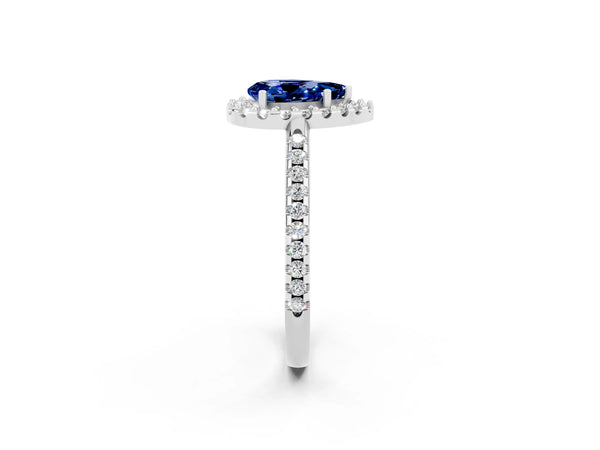 Platinum Pear Cut Blue Sapphire Pavé Halo Ring with Four-Prong Setting