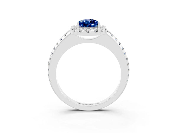 Silver Pear Cut Blue Sapphire Pavé Halo Ring with Four-Prong Setting