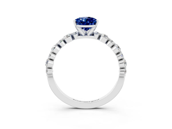 Silver Pear Cut Blue Sapphire Prong Set Engagement Ring with Pavé Band