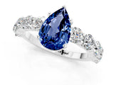 White gold Pear Cut Blue Sapphire Prong Setting with Side Stones on a Pave Band_1