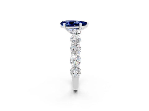 White gold Pear Cut Blue Sapphire Prong Setting with Side Stones on a Pave Band_2