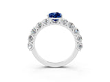 White gold Pear Cut Blue Sapphire Prong Setting with Side Stones on a Pave Band_3
