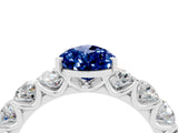 White gold Pear Cut Blue Sapphire Prong Setting with Side Stones on a Pave Band_4