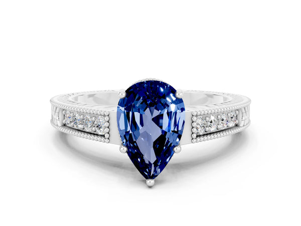 Platinum Pear Cut Blue Sapphire Ring with Milgrain Pavé Band and Four-Prong Setting