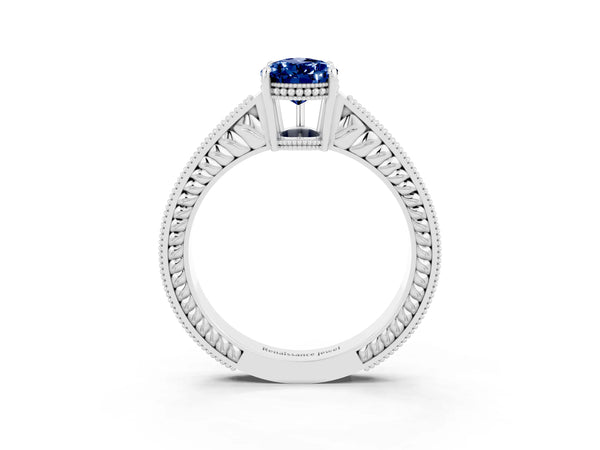 Silver Pear Cut Blue Sapphire Ring with Milgrain Pavé Band and Four-Prong Setting