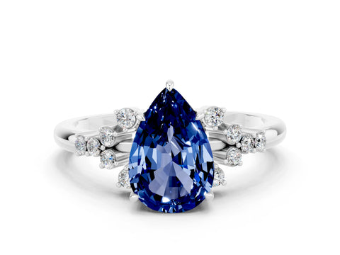 White gold Pear Cut Blue Sapphire Ring with Side Stones and Four-Prong Setting_36