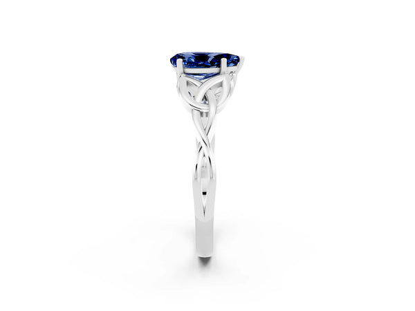 Platinum Pear Cut Blue Sapphire Solitaire Celtic Knot Ring with Four-Prong Setting