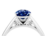 White gold Pear Cut Blue Sapphire Solitaire Engagement Ring with Cathedral Setting and Four-Prong Mount_136