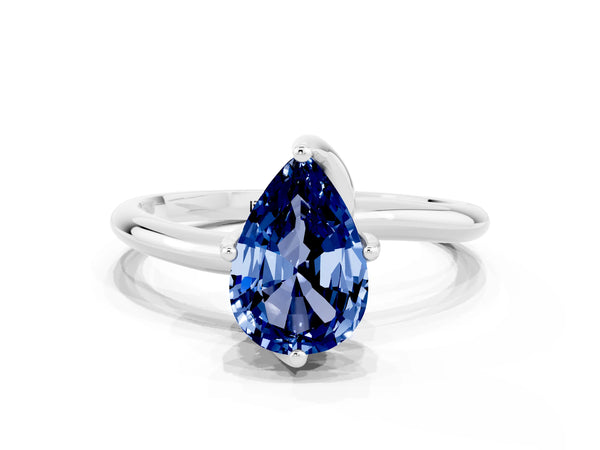 Platinum Pear Cut Blue Sapphire Solitaire Engagement Ring with Four-Prong Setting and Classic Band