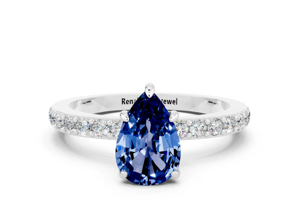 Silver Pear Cut Blue Sapphire Solitaire Engagement Ring with Pavé Band and Four-Prong Setting