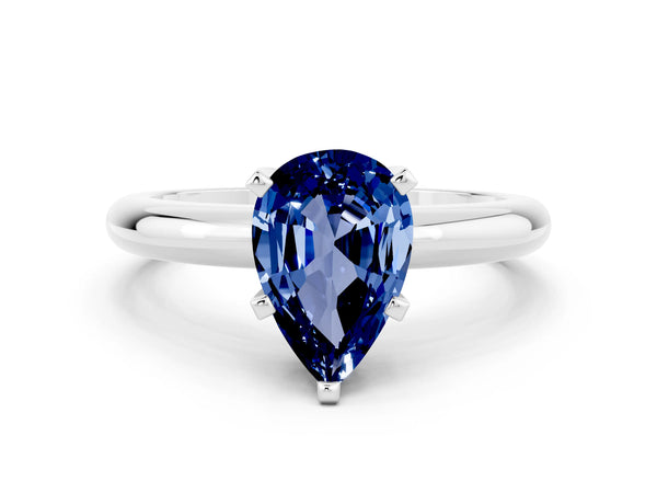 Platinum Pear Cut Blue Sapphire Solitaire Engagement Ring with Round Band and Four-Prong Setting
