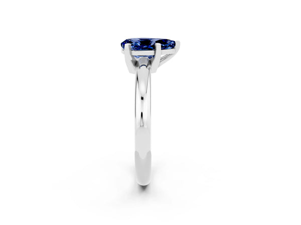 Silver Pear Cut Blue Sapphire Solitaire Engagement Ring with Round Band and Four-Prong Setting