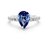 White gold Pear Cut Blue Sapphire Solitaire Pavé Band with Four-Prong Setting