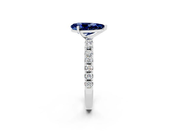White gold Pear Cut Blue Sapphire Solitaire Pavé Band with Four-Prong Setting