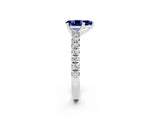 White gold Pear Cut Blue Sapphire Solitaire Pavé Engagement Ring with Round Band and Prong Setting_81
