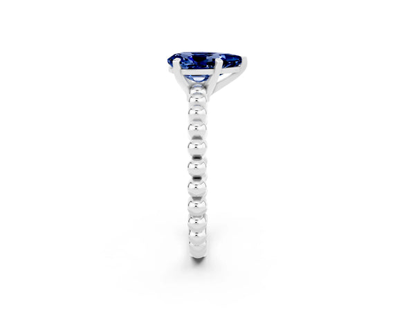 Platinum Pear Cut Blue Sapphire Solitaire Ring with Beaded Band and Prong Setting