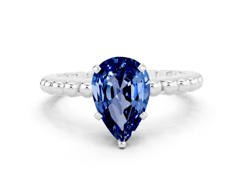 White gold Pear Cut Blue Sapphire Solitaire Ring with Beaded Band and Prong Setting